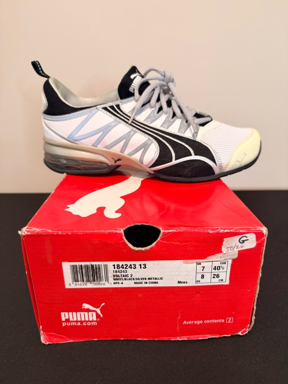 Puma  White, Black and Silver Athletic Sneakers